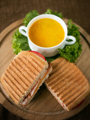 Turkish borek rolls with spinach and cheese on the white plate. A traditional Turkish pastry