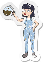 retro distressed sticker of a cartoon woman in dungarees with coffee
