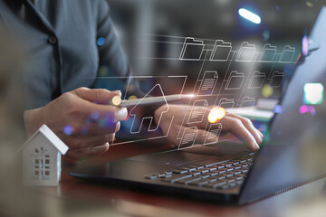 An attorney studies real estate on a virtual screen.
