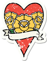 traditional distressed sticker tattoo of a heart and banner with flowers