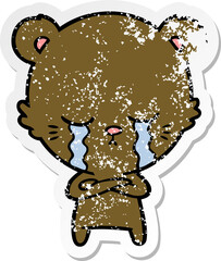 distressed sticker of a crying cartoon bear