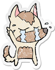 distressed sticker of a cartoon crying wolf