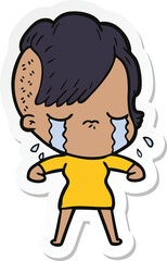 sticker of a cartoon crying girl