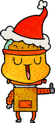 happy textured cartoon of a robot wearing santa hat