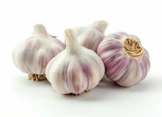 High-quality image of fresh garlic bulbs and a single clove isolated on a white background, highlighting the natural texture and form