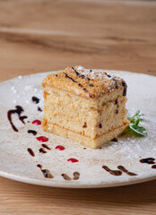 Piece of apple pie with chocolate sauce