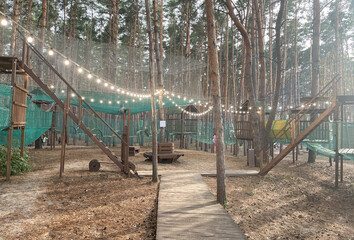 Fototapeta premium Amusement park in the forest for children.