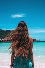 Obraz premium young woman in a bikini on the beach