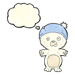 cartoon cute polar bear in hat with thought bubble