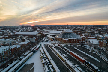 Drone View of Baltimore City Houses with Snow Covered Roofs at Sunset