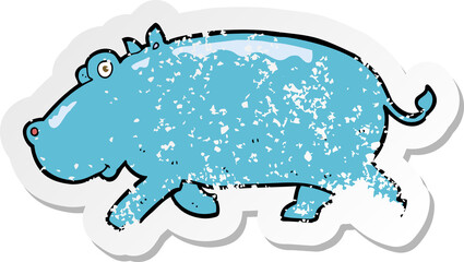 retro distressed sticker of a cartoon hippopotamus