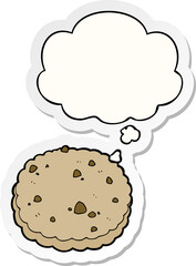 cartoon biscuit and thought bubble as a printed sticker