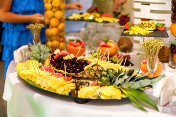 Table is set with variety of fresh fruit