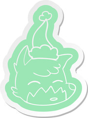 cartoon  sticker of a fox face wearing santa hat