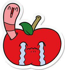 sticker of a cartoon worm eating an apple