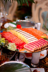Variety of sushi is served on platter