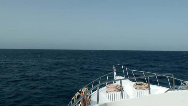 Scenery of beautiful sky horizon and clear water with boat, Red sea Egypt. Boat was equipped with powerful engine and had plenty of storage space for their gear.