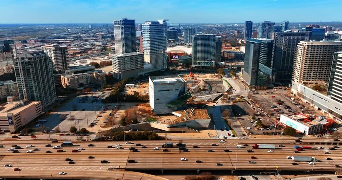 Numerous transport moves by the roads at daytime. Panoramic view of Dallas, Texas, USA from top.