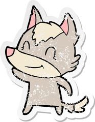 distressed sticker of a friendly cartoon wolf