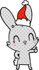 cute comic book style illustration of a rabbit wearing santa hat