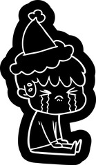 cartoon icon of a boy crying wearing santa hat