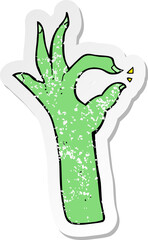 retro distressed sticker of a cartoon most excellent hand gesture