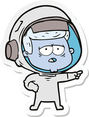 sticker of a cartoon tired astronaut