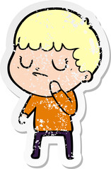 distressed sticker of a cartoon grumpy boy