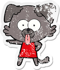 distressed sticker of a cartoon dog with tongue sticking out