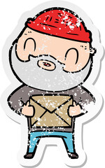 distressed sticker of a cartoon bearded man