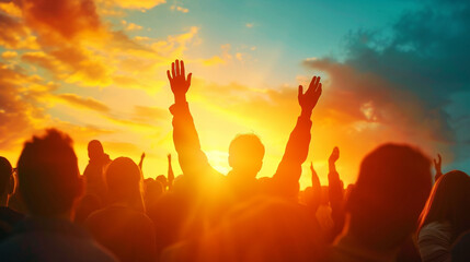 Silhouettes of people with hands raised in worship at a religious service, against a vibrant sunset, religion background, dynamic and dramatic compositions, with copy space