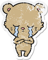 distressed sticker of a crying cartoon bear