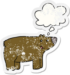 cartoon bear and thought bubble as a distressed worn sticker