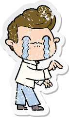 distressed sticker of a cartoon man crying