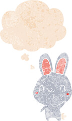 cartoon rabbit waving and thought bubble in retro textured style