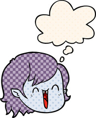 cartoon vampire girl face and thought bubble in comic book style