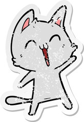 distressed sticker of a happy cartoon cat