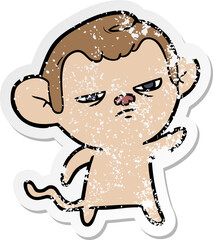 distressed sticker of a cartoon annoyed monkey