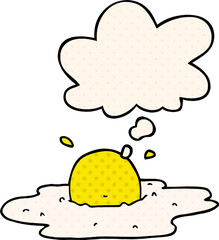 cartoon fried egg and thought bubble in comic book style