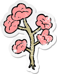 distressed sticker of a cartoon flowers