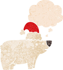 cartoon bear wearing christmas hat and thought bubble in retro textured style