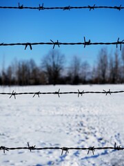 Electrified fence on extermination camps
