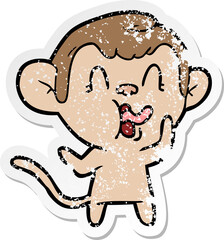 distressed sticker of a crazy cartoon monkey