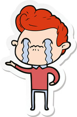 sticker of a cartoon man crying