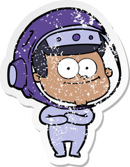 Obraz na płótnie Canvas distressed sticker of a happy astronaut cartoon