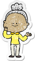 distressed sticker of a cartoon happy old woman