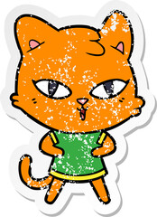 distressed sticker of a cartoon cat