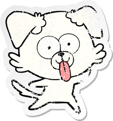distressed sticker of a cartoon dog with tongue sticking out