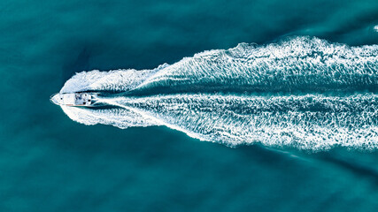 Aerial view of sea, blue waters and coast of Brighton, East Sussex, UK - Powered by Adobe