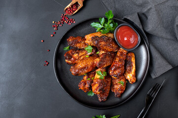 Spicy chicken  wings in bbq sauce , spicy chicken wings cooked in the air fryer